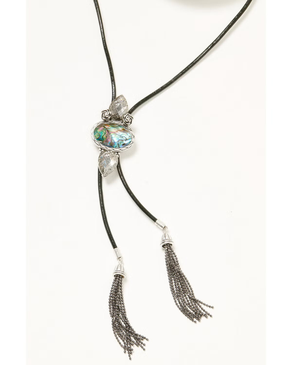 Necklace with a large central gemstone and tassels on a white background