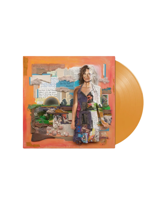 Orange vinyl record of amy grant the me that remains with collage style album cover featuring woman in layered clothing