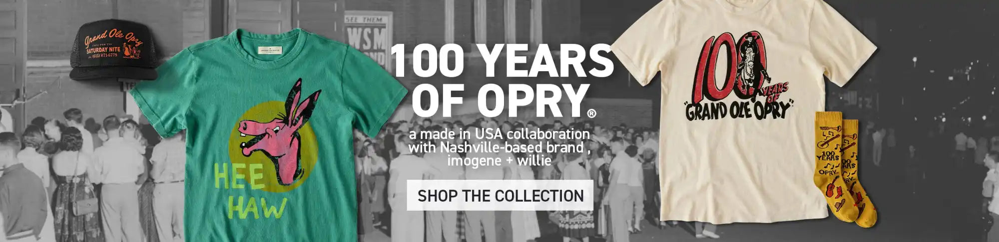 A banner advertising ’100 YEARS OF OPRY’ featuring a green t-shirt with a pink donkey and ’HEE HAW’ text, a black cap, and a cream t-shirt with ’100 GRAND OLE OPRY’ text, and yellow socks.