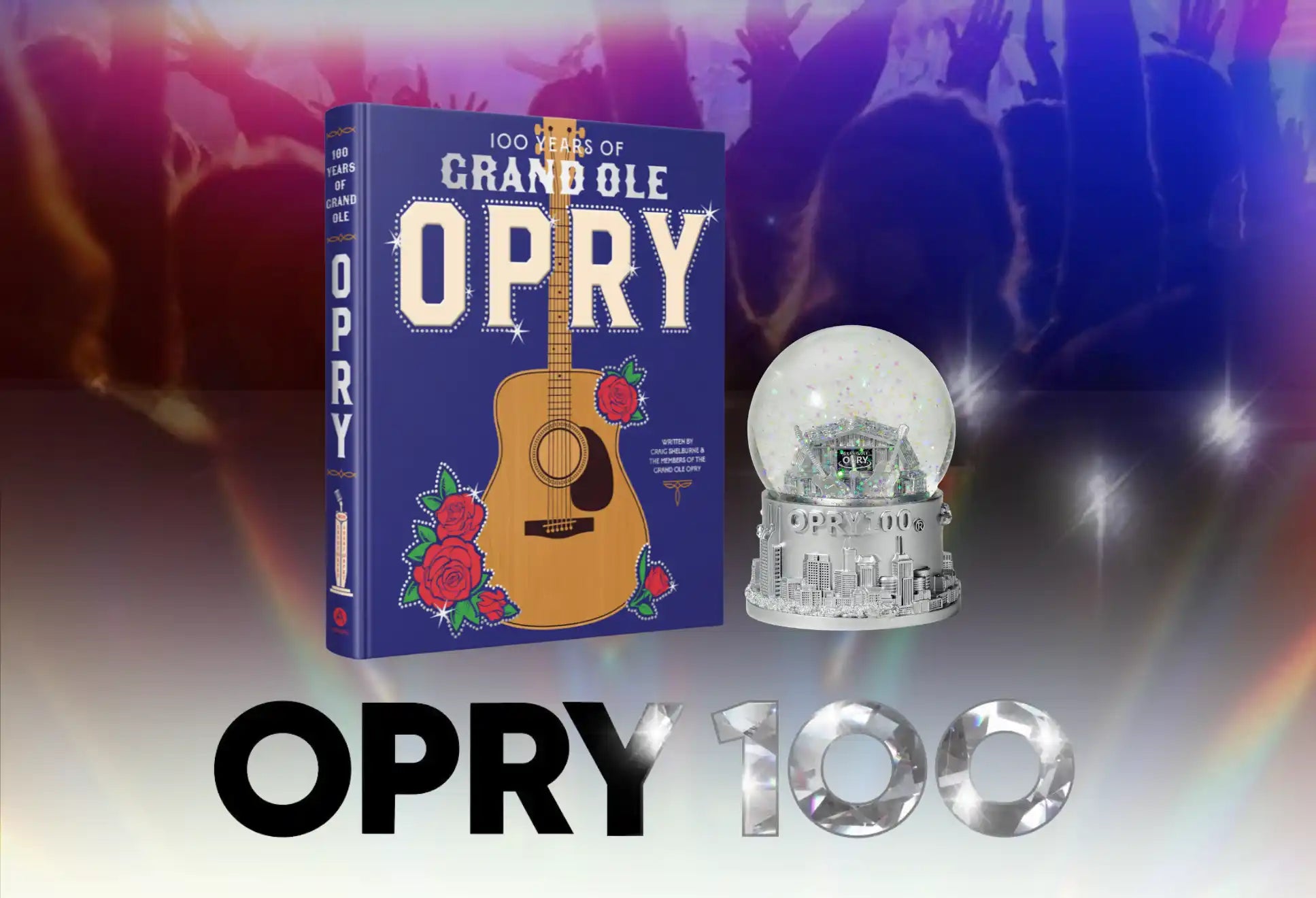 A blue book titled ’100 Years of Grand Ole Opry’ featuring a guitar and roses design.