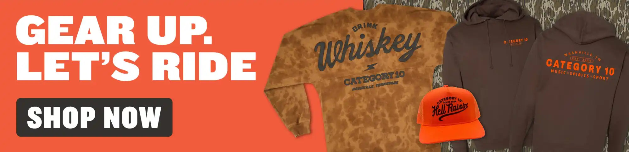 Brown and orange hoodie with ’whiskey’ text design, made of fleece material.