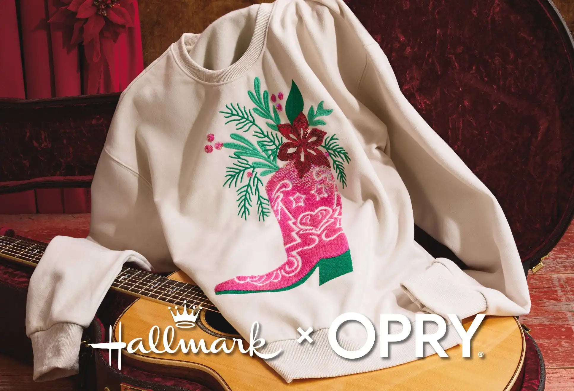 Cream-colored sweatshirt with a pink cowboy boot and Christmas floral design.