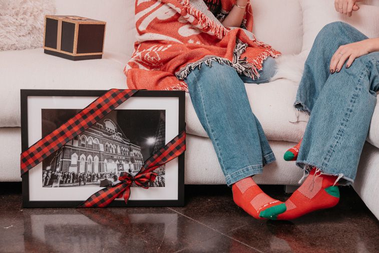 Framed Black and white Print in black frame. Exterior of The Ryman with Fans Outside