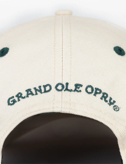 Beige baseball cap with dark green embroidered grand ole opry logo and matching eyelets in opry long live country hat