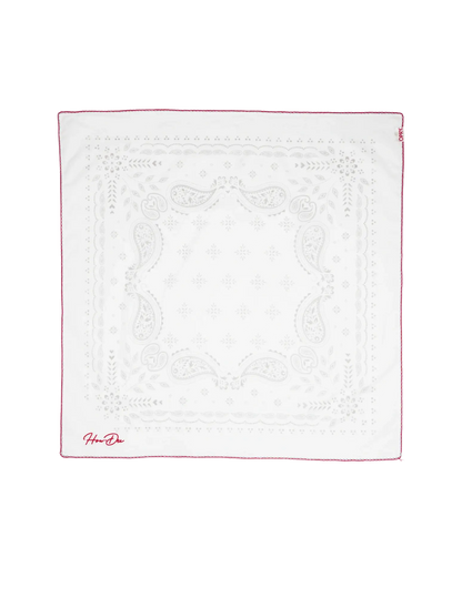 White square bandana with subtle cream paisley embroidery and thin red border featuring hermès signature in red