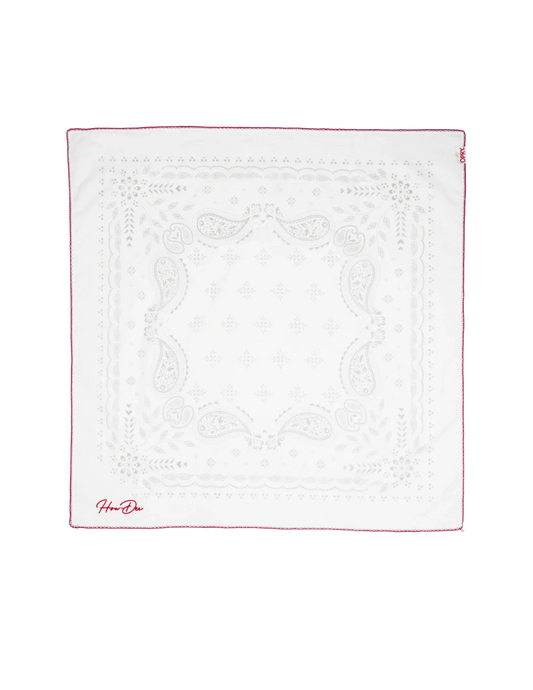 White square bandana with subtle cream paisley embroidery and thin red border featuring hermès signature in red