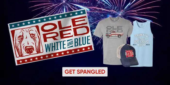 A promotional display for ’Ole Red’ merchandise, featuring a flag-themed graphic, a t-shirt, a tank top, and a baseball cap.