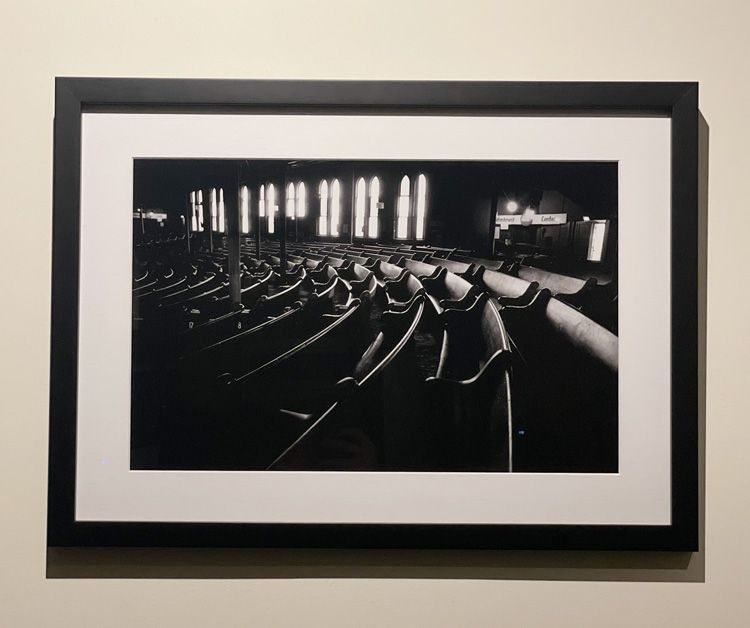 Framed Black and white Print in black frame. Ryman Pews and Windows